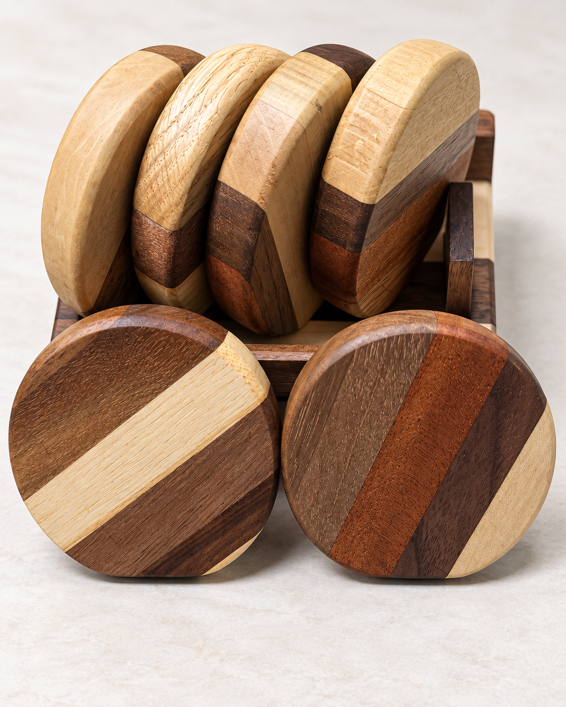 Polished studio photo of handcrafted mixed hardwood coaster set